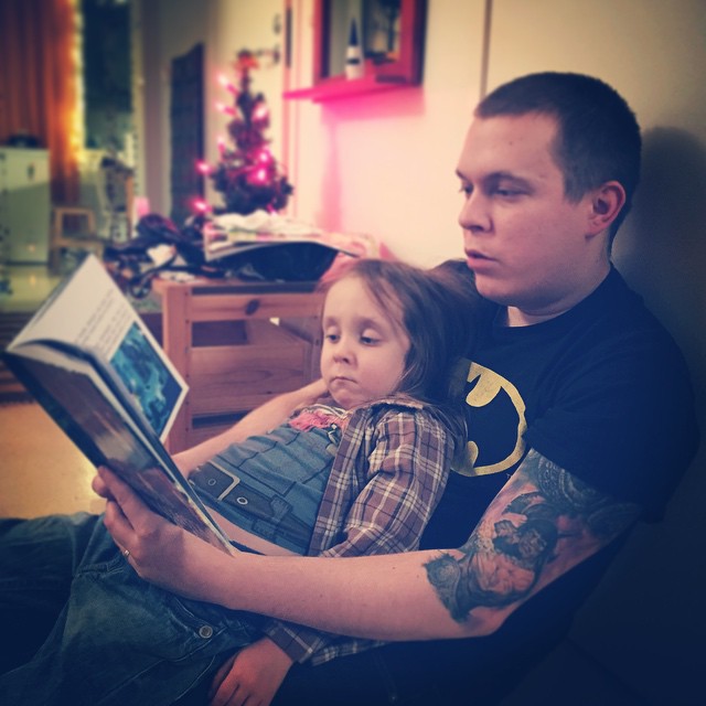 Reading our book to my son, 2014.