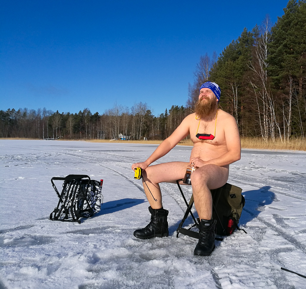 Nude ice fishing foto.
